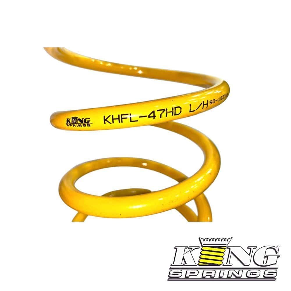 High-quality yellow coil spring for industrial and automotive applications. Durable and reliable sus.