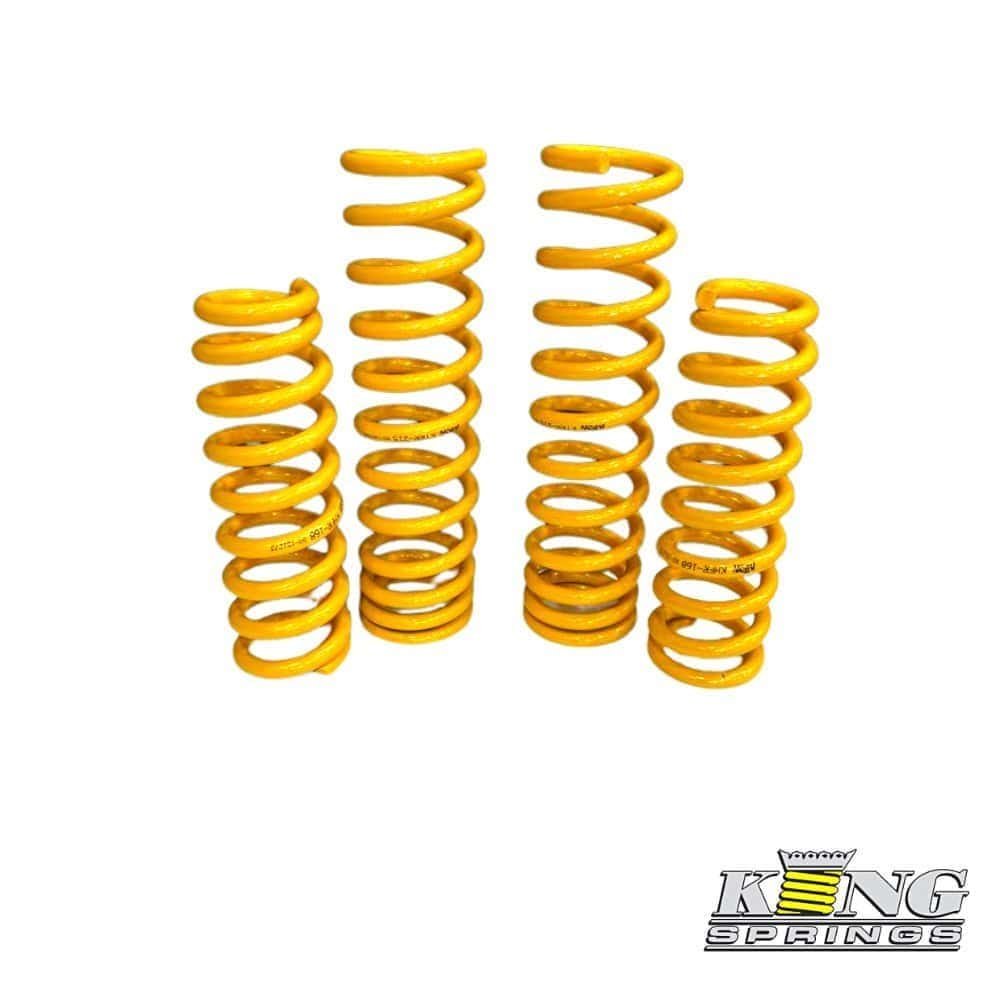 Yellow coil springs for automotive suspension, high-quality and durable.