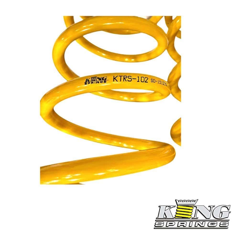 High-quality yellow coil spring for industrial and mechanical applications.