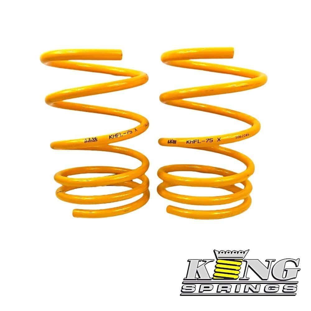 High-quality yellow coil springs for automotive suspension systems.