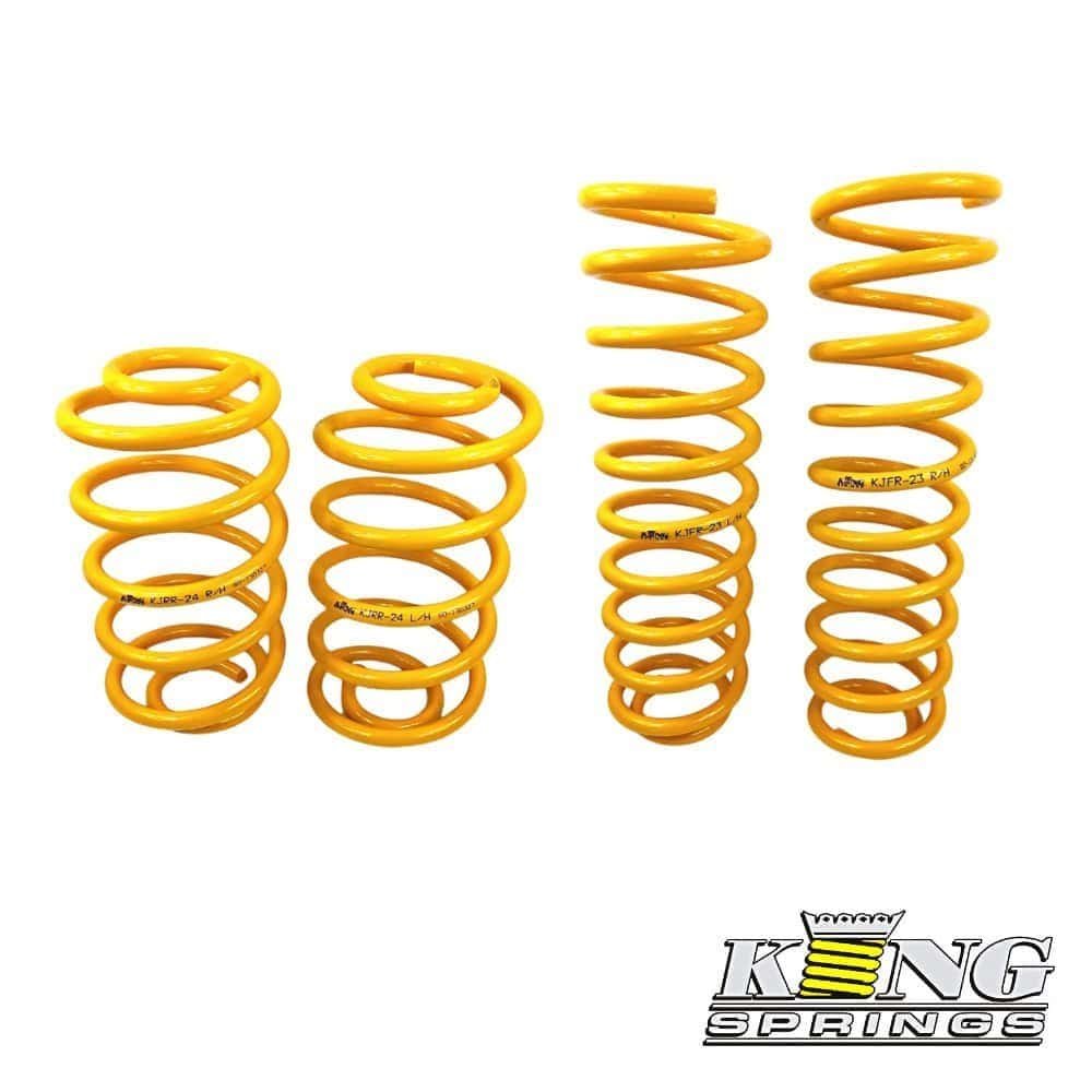 Yellow coil springs for automotive suspension, high-quality and durable.