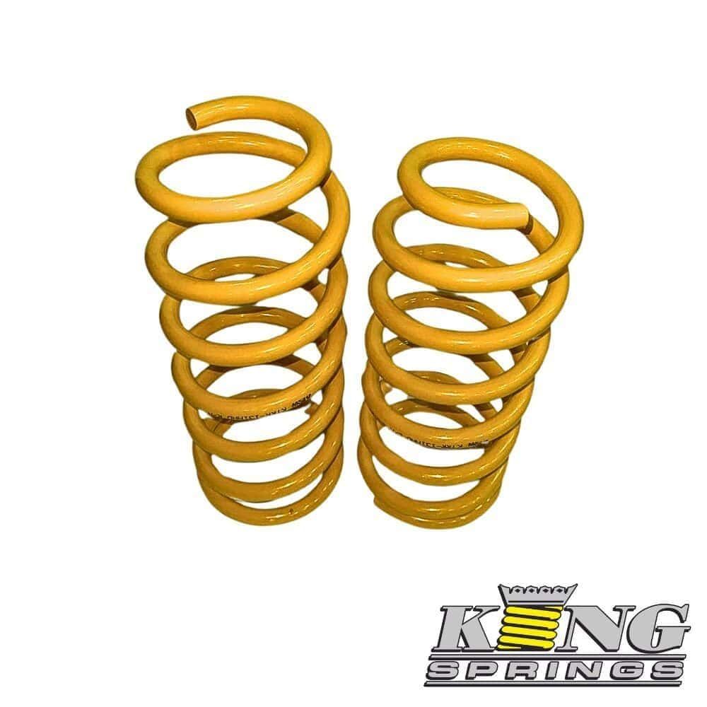 Yellow coil springs for industrial or automotive use.