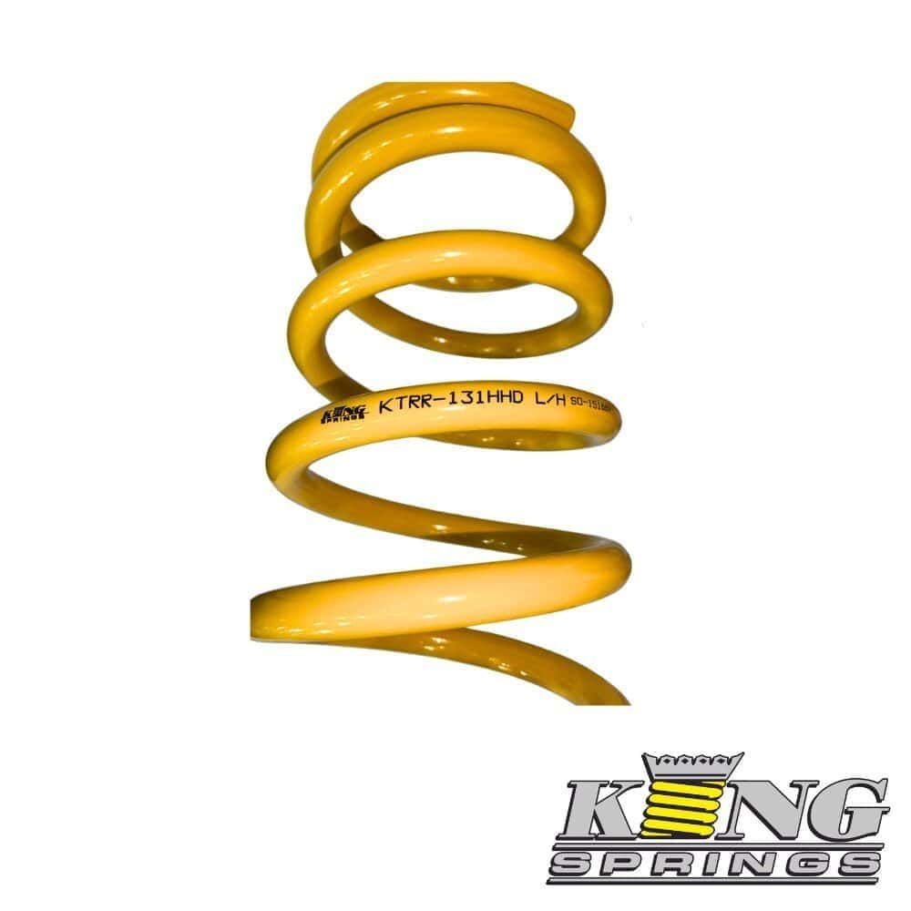 High-quality yellow coil spring for industrial and automotive applications.