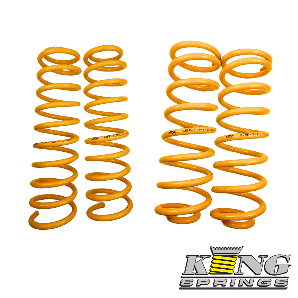 Yellow coil springs for automotive suspension, high-quality King Springs brand.