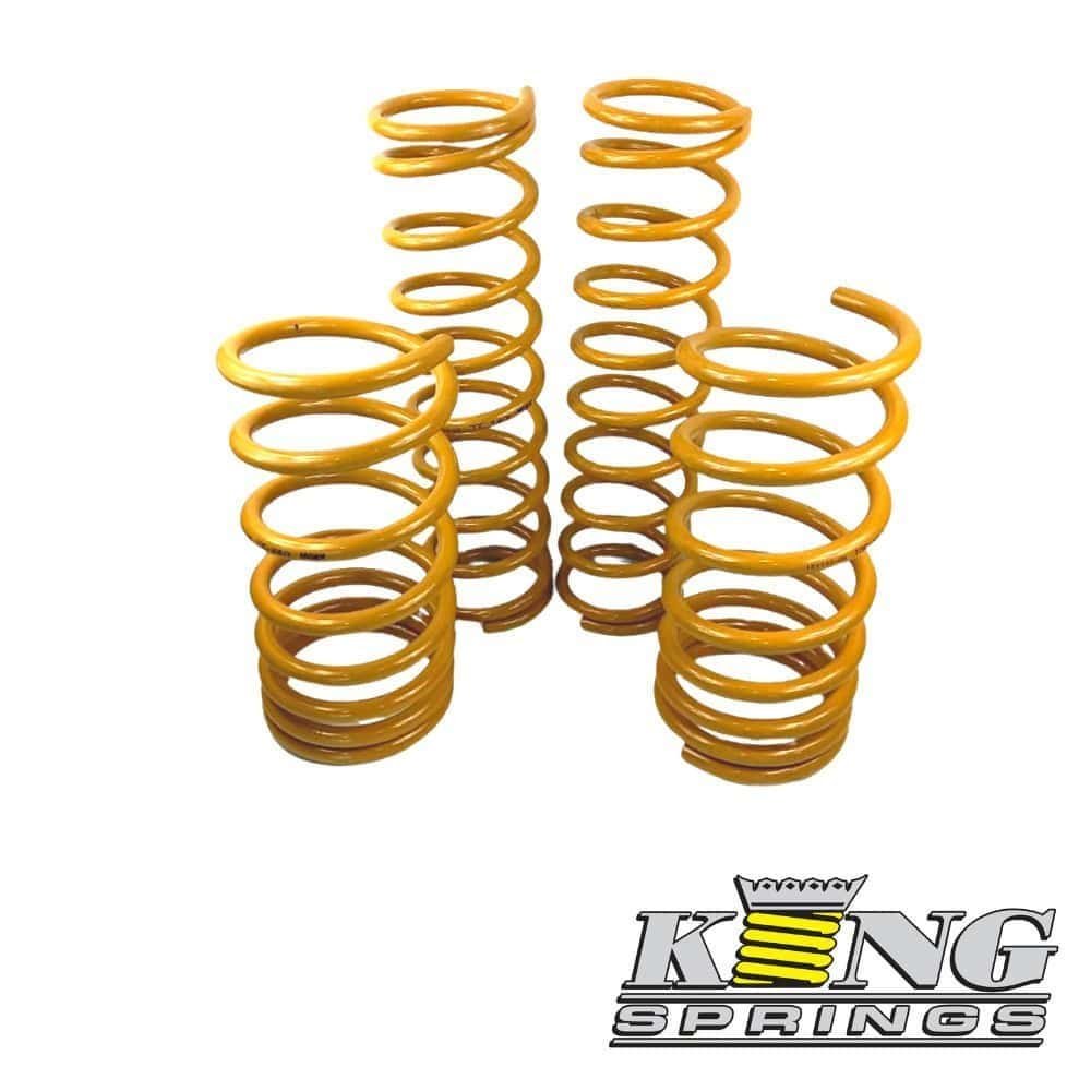 Yellow coil springs for industrial or automotive use, high-quality and durable.