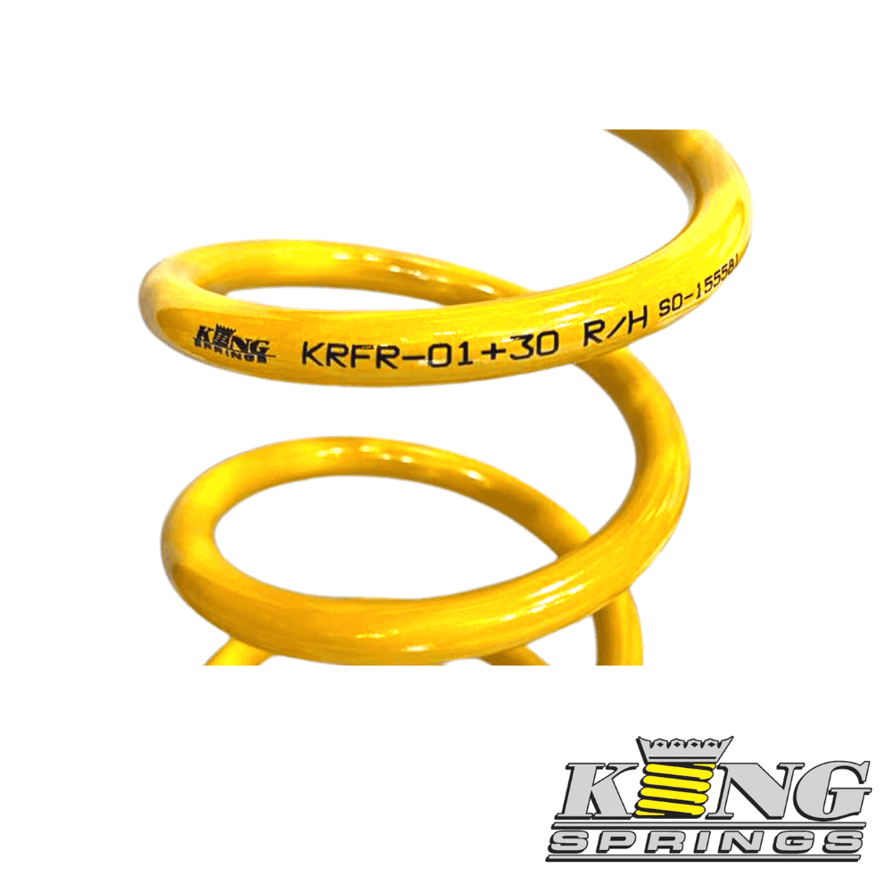 High-quality yellow coil spring for industrial and automotive applications.