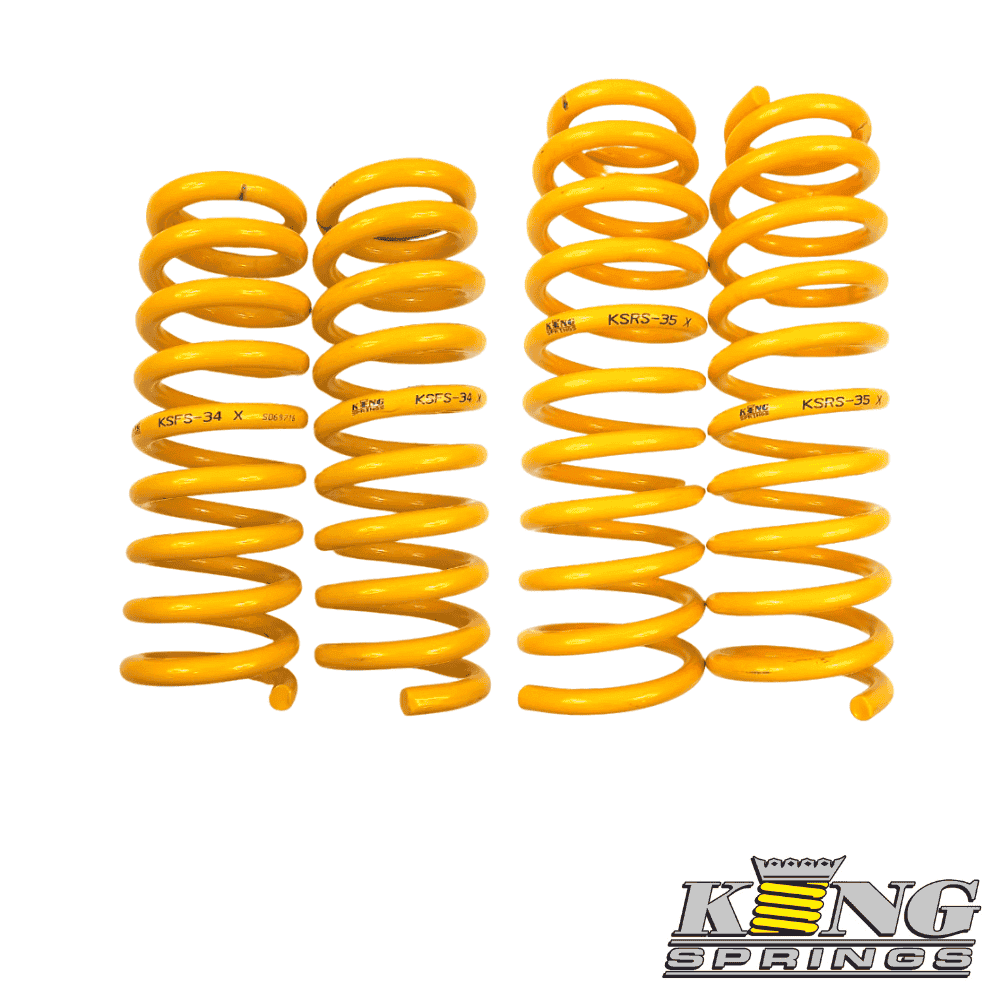 Heavy-duty yellow coil springs for automotive suspension systems. Durable, high-performance springs.