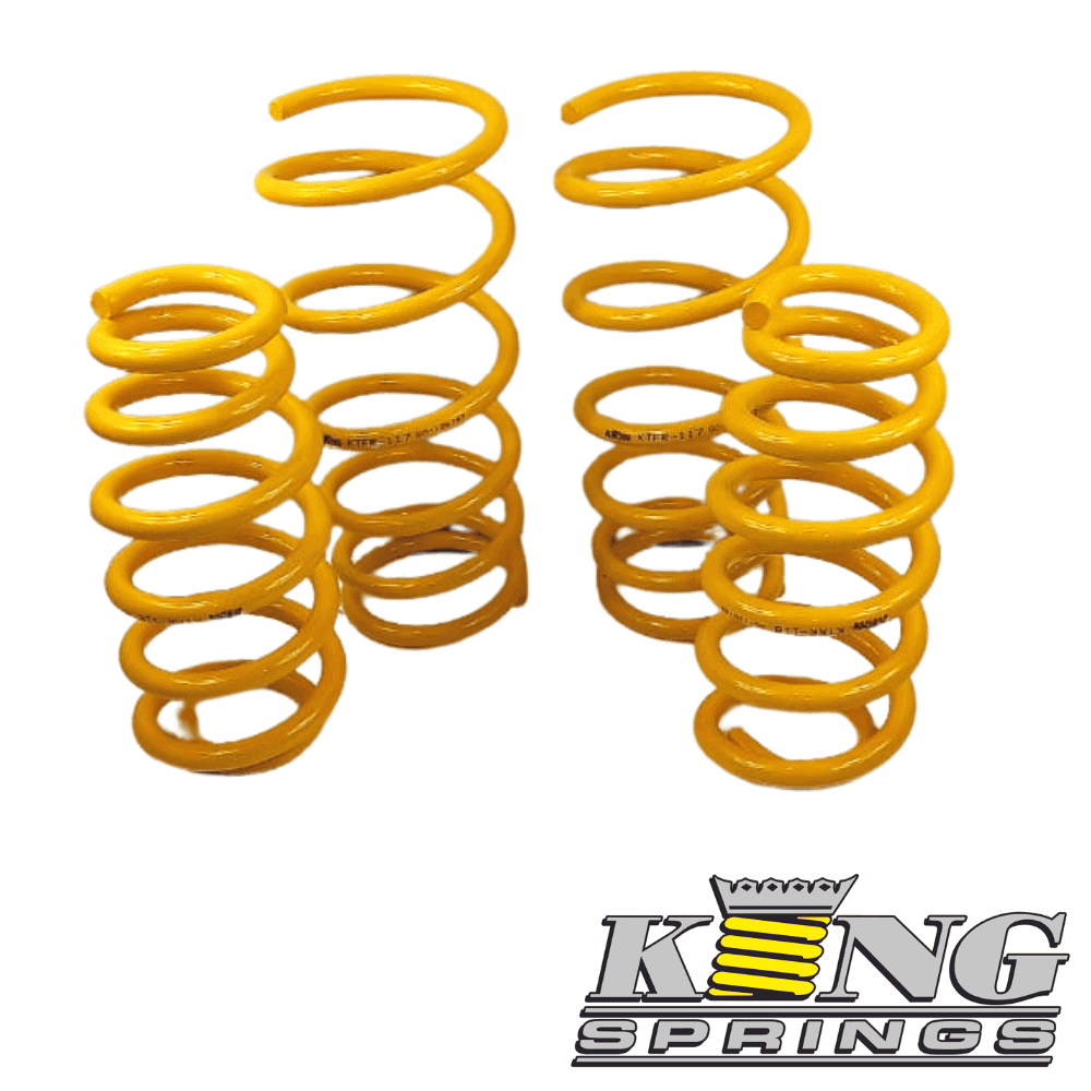 Yellow coil springs for automotive suspension, high-quality and durable.