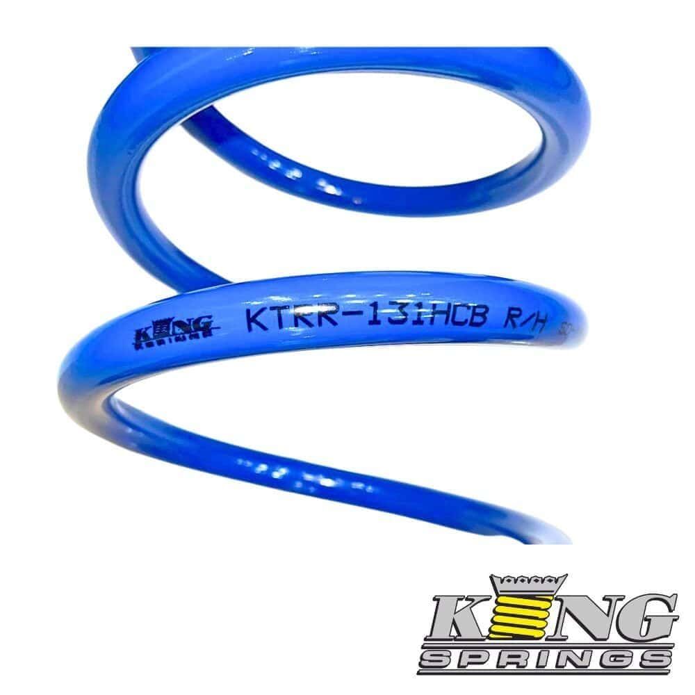 High-quality blue coil spring for industrial and automotive applications by King Springs. Durable an.