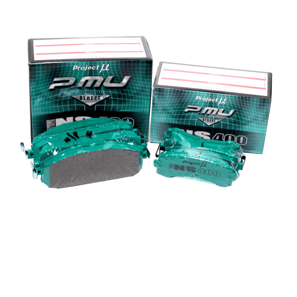 High-quality automotive brake pads with packaging from Al Shiba General Trading, Dubai.