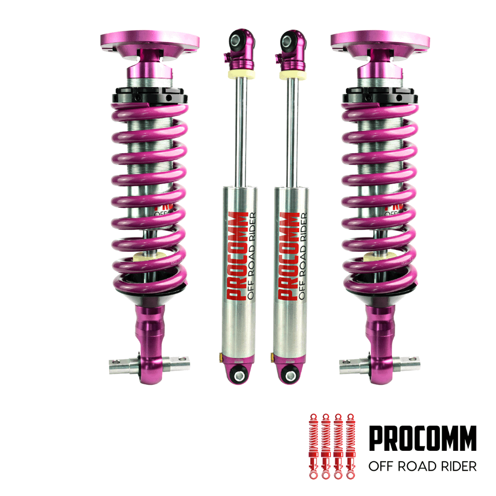 High-performance purple shock absorbers for off-road vehicles by PROCOMM. Durable suspension compone.