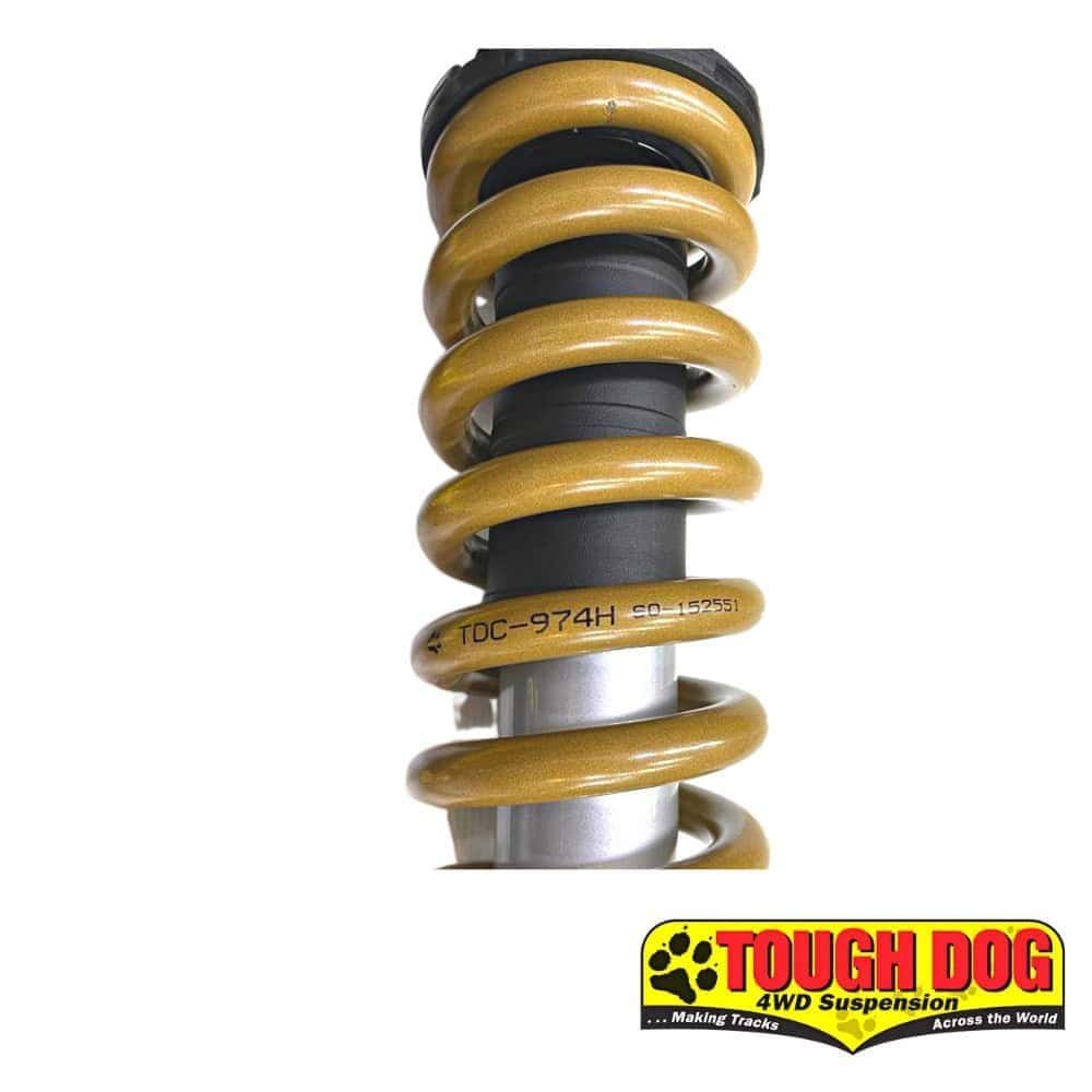 High-quality automotive shock absorber with yellow coil spring for vehicle suspension systems.