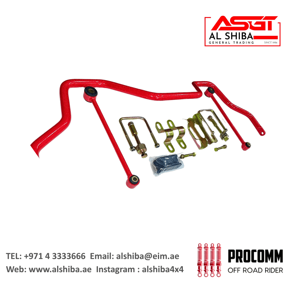 Red off-road vehicle suspension parts with bolts and tools for automotive repair and customization.