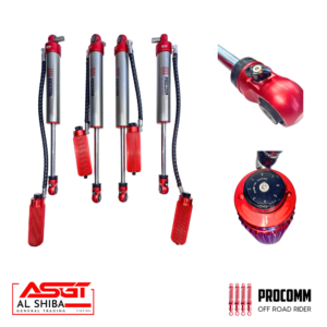Set of red-and-silver off-road shock absorbers with mounting hardware and a control knob, branded by Procomm and Al Shiba General Trading (ASGT).