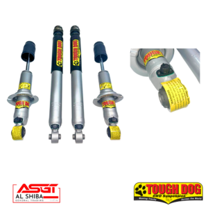 Four Tough Dog 4WD shock absorbers lined up with yellow warning tags and rubber boots, plus close-up view of a component on the right; brand logos at bottom corners.