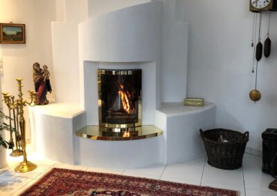 Stufe e caminetti ad accumulo di calore e irraggiamento termico