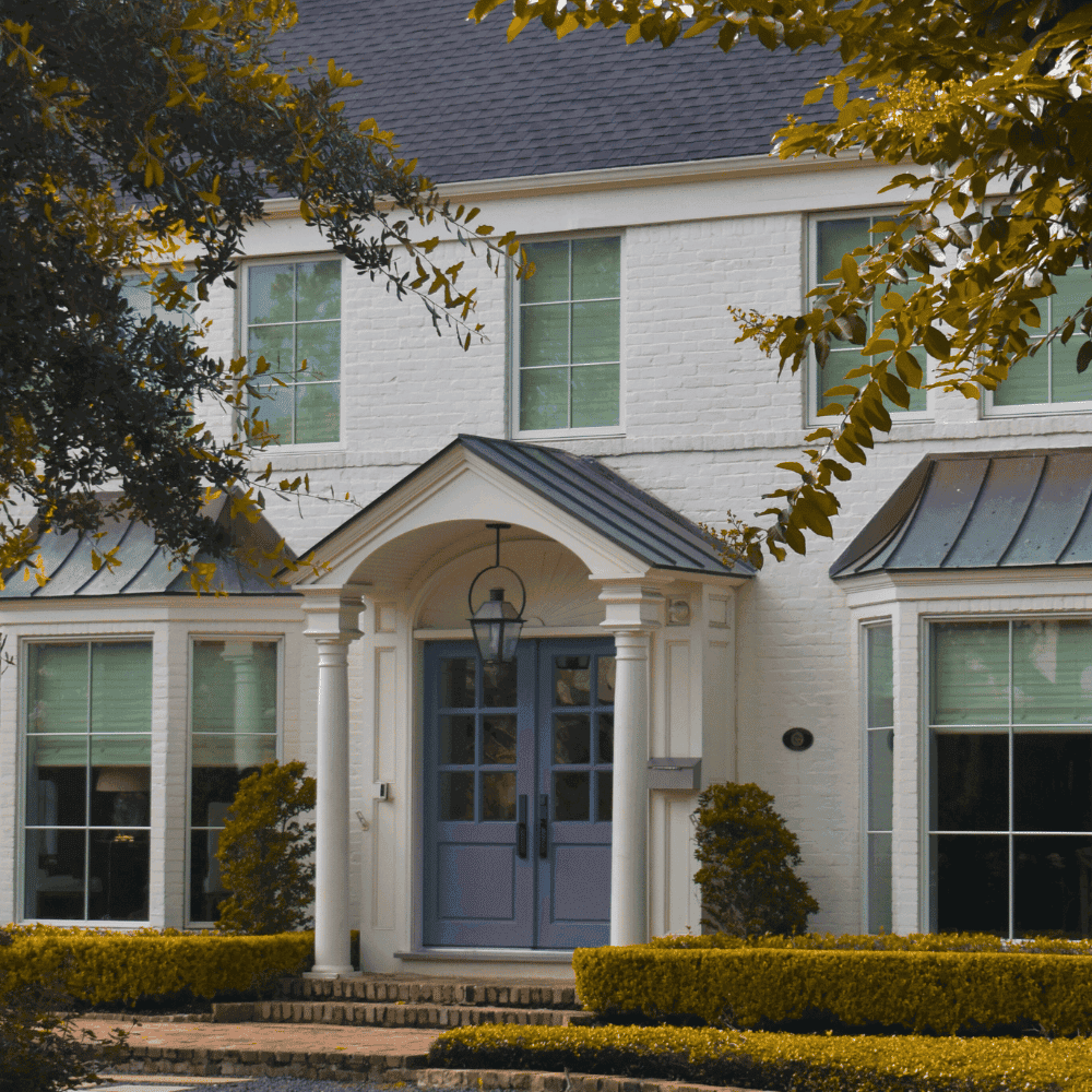 Home insurance quote Joliette home insurance joliette Facade of a house with blue door.