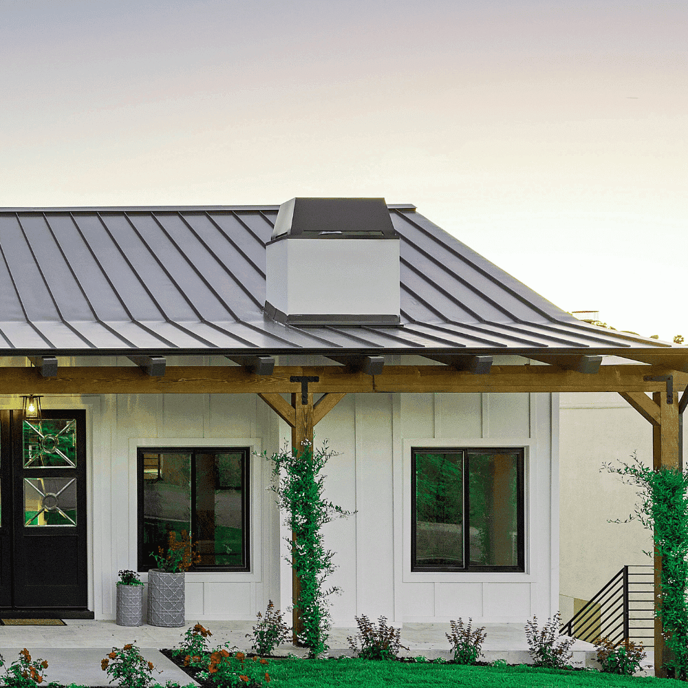 Home insurance quote Saint-Augustin-de-Desmaures Modern house with metal roof and garden.