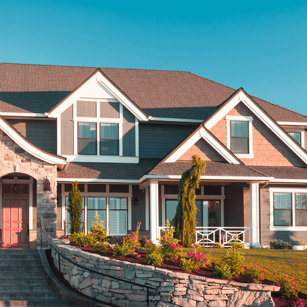 Saint-Lambert Home Insurance Quote Beautiful modern house with flowered garden.