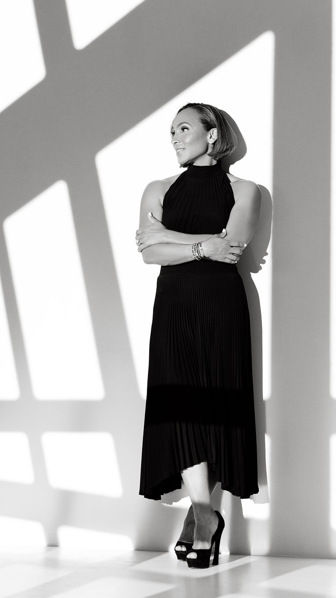 Dr. Johnson in black dress and heels on Instagram