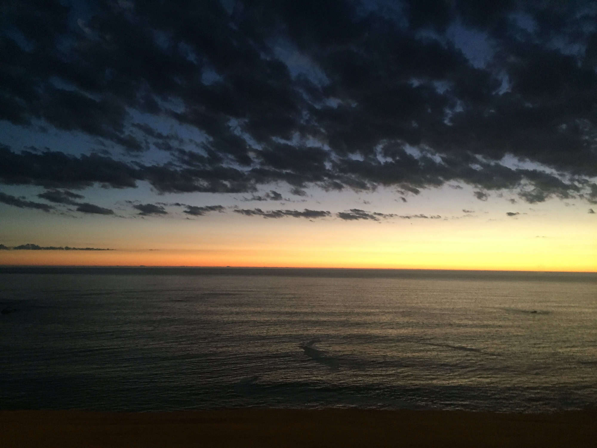 The sunset over the Atlantic Ocean in Clifton, South Africa.  Clifton has stunning South African sunsets.