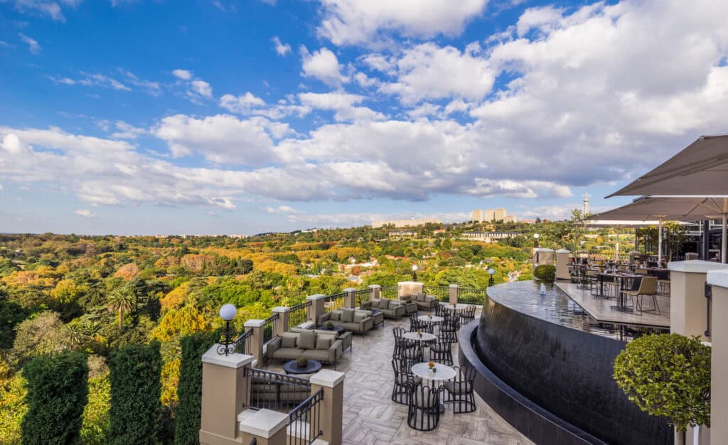 The terrace at Flames at the Four Seasons the Westcliff.  Flames has stunning views across Johannesburg.  Photo credit: Ken Seet / Four Seasons.