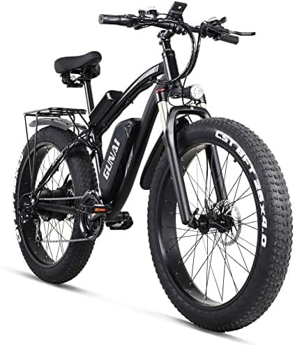 Bici elettrica da montagna GMRK 9000 per avventure all'aperto, con telaio robusto, pneumatici grandi e autonomia elevata, ideale per esplorare sentieri e terreni difficili.