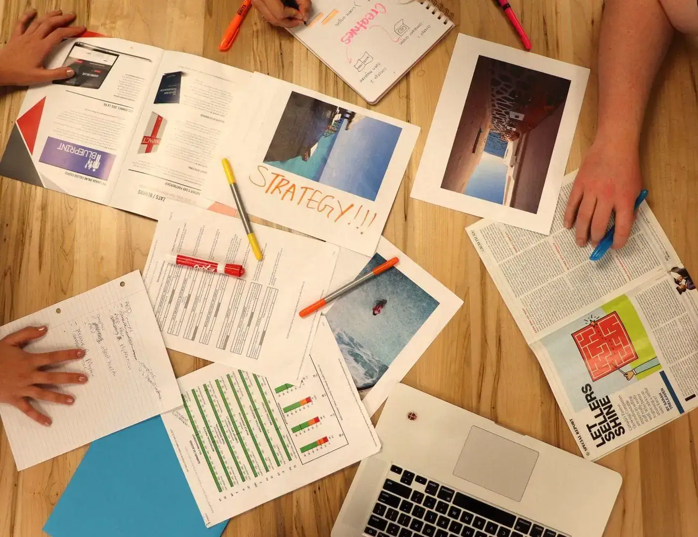 a group of people creating a social media strategy for a business