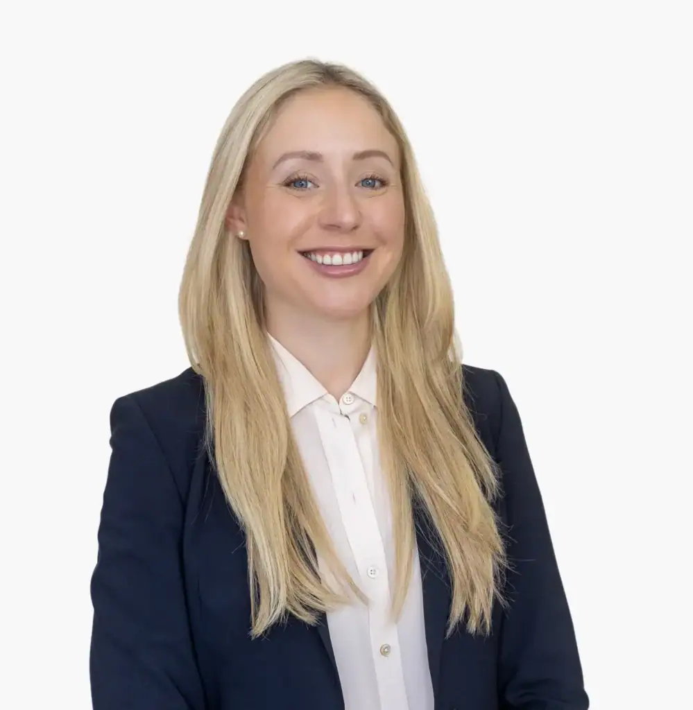 Professional woman in business attire for Watson Investments.