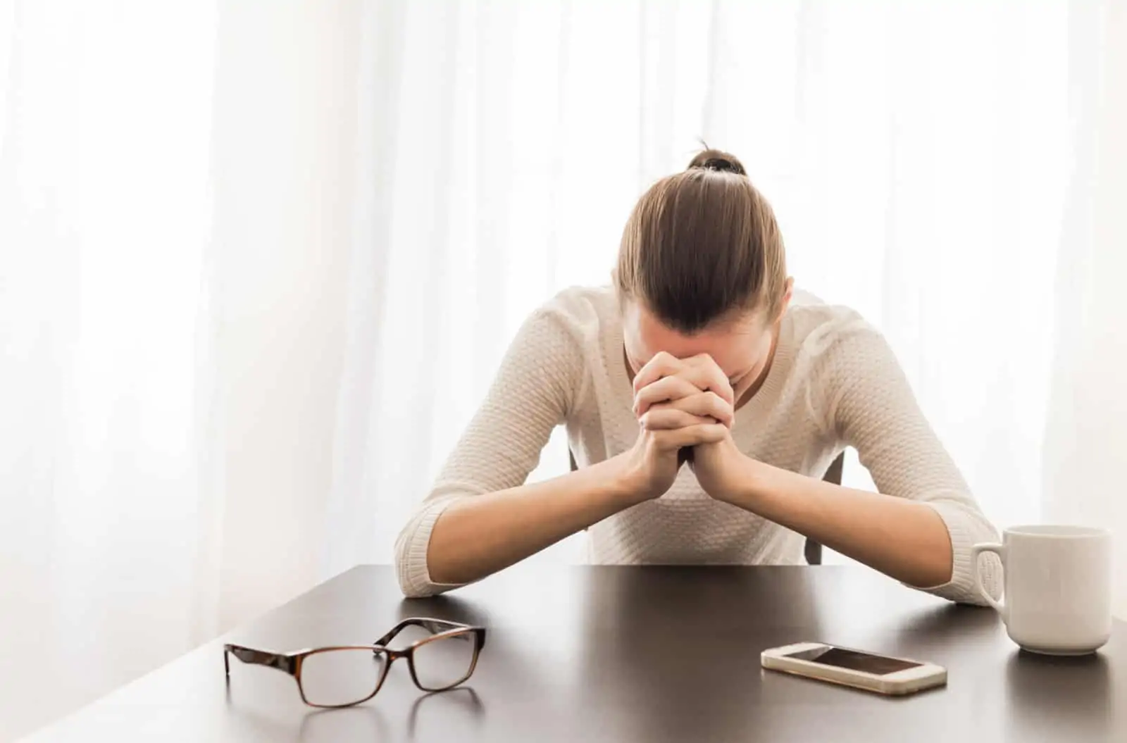 CBT for Worry-woman with head in hands