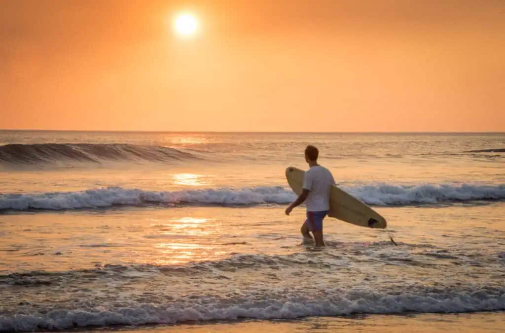 Beginner Surfer of Nicaragua Surf Camp goes for sunset session