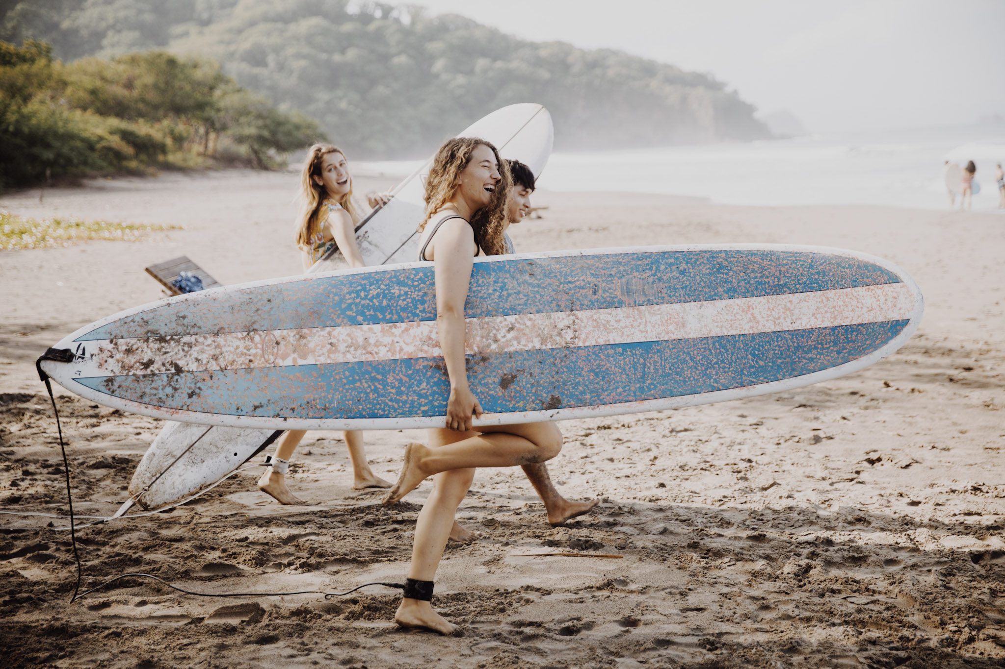 Girls learn how to surf at Nicaragua Surf Camp