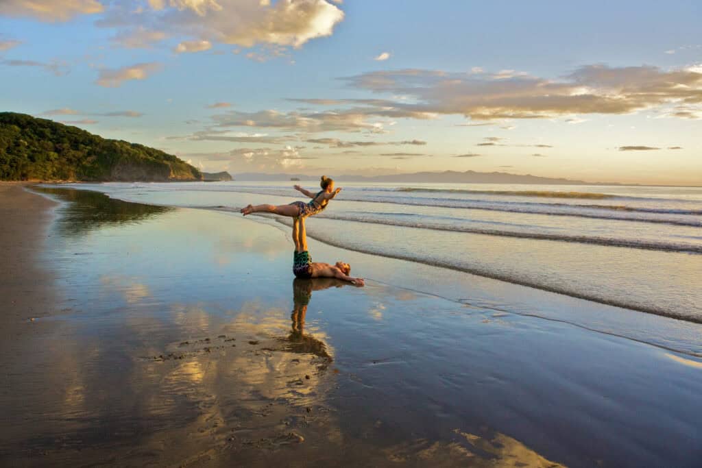acroyoga on the beach playa escameca, nicaragua
