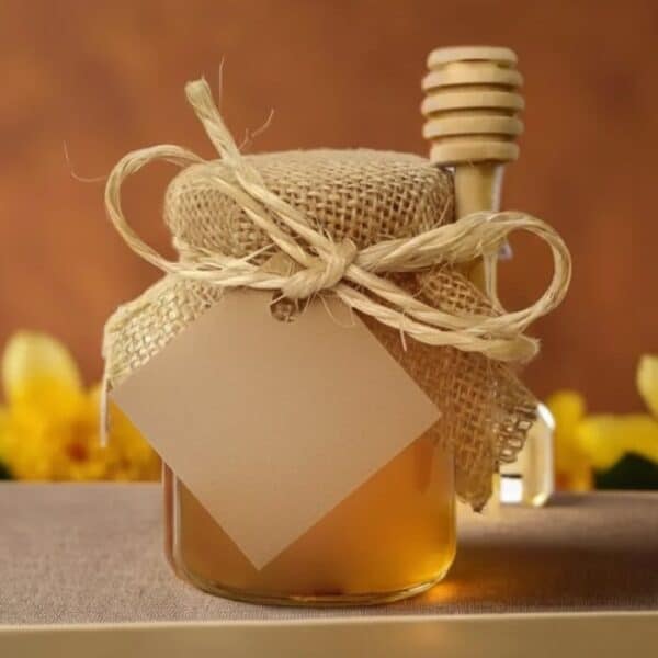 Tarro de miel artesanal con etiqueta marrón