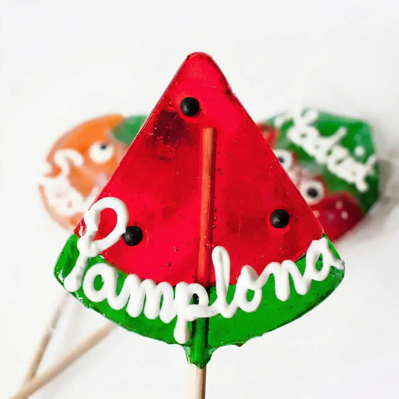 Galletas con forma de campana decoradas para Navidad.