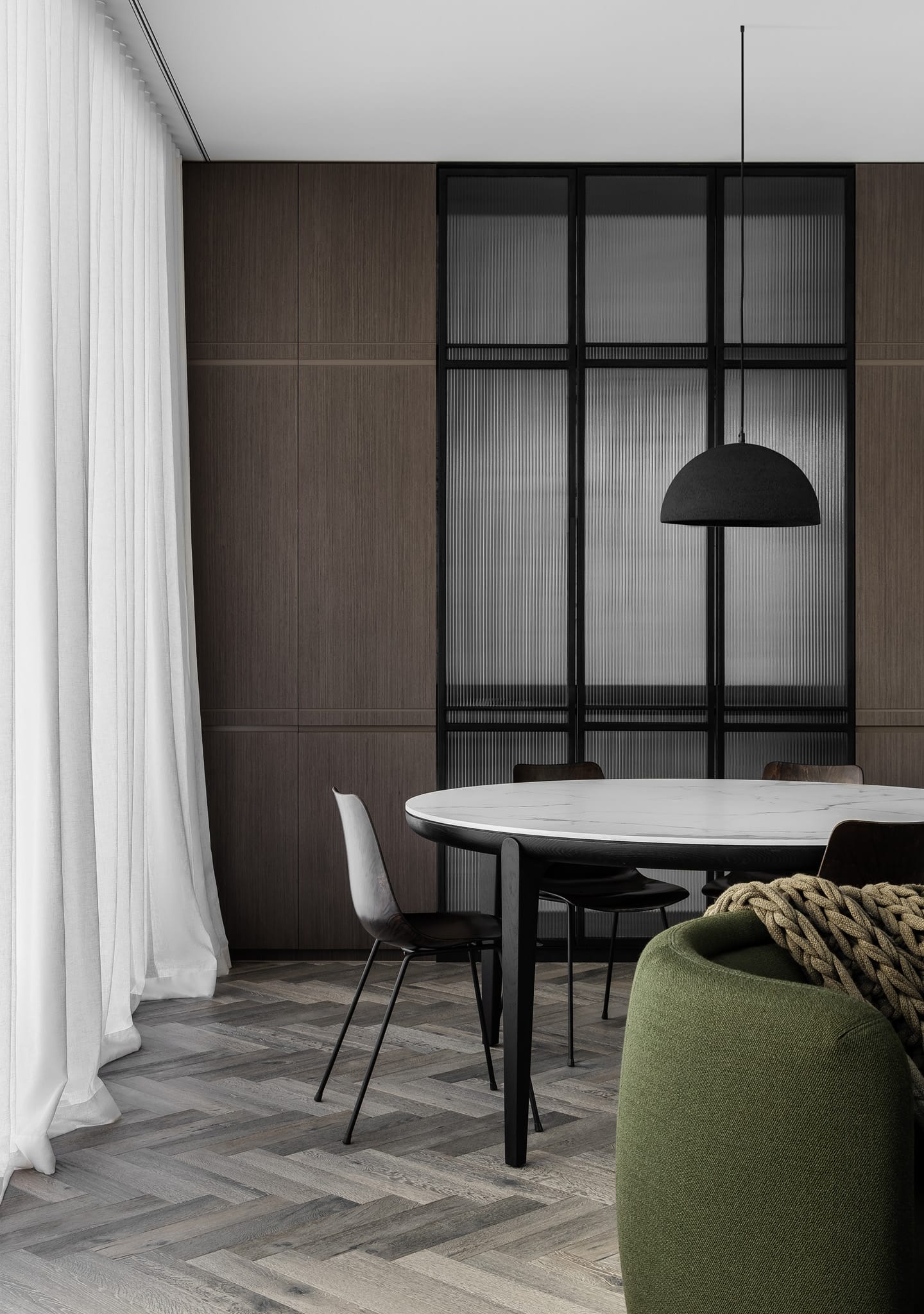 HC28 Erika Dining Table Round: Black Oak with Venetian White Top. Image Credit: Timothy Kaye X Megowan Architectural