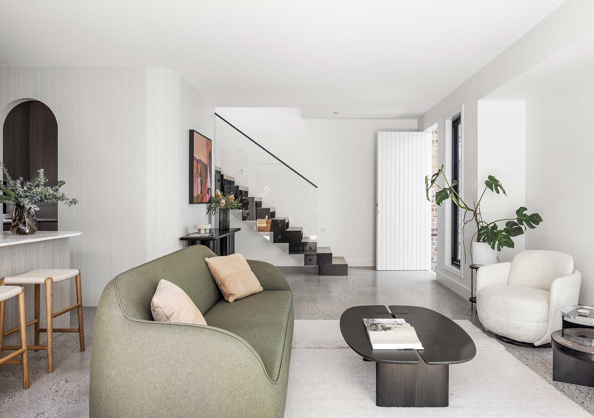 HC28: Bear Sofa. Ligne Roset: Intervalle Coffee Table. Wittmann: Miles Swivel Armchairs.