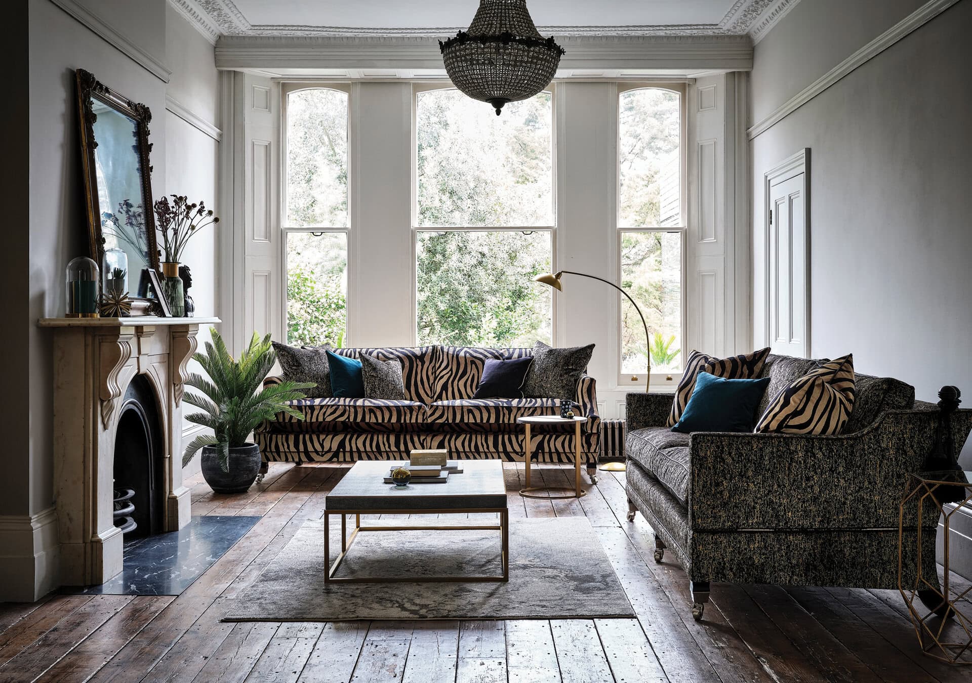 DURESTA: Custom Hornblower crafted in zebra fabric beside custom Trafalgar sofa