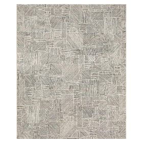 Gray area rug with abstract geometric line pattern in a patchwork design