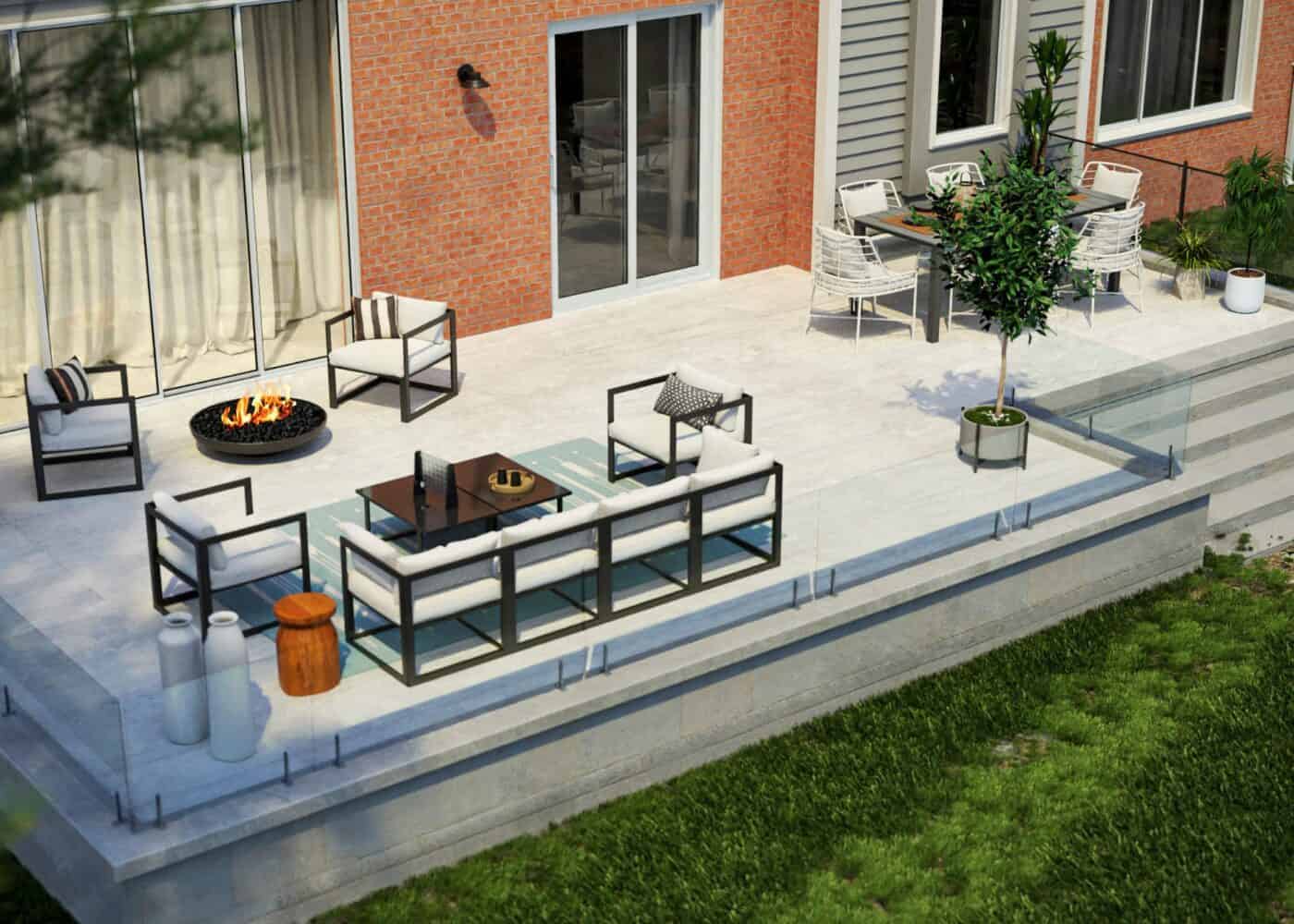 Spacious outdoor patio with modern furniture, a fire pit, a dining area, and a potted tree next to a brick house