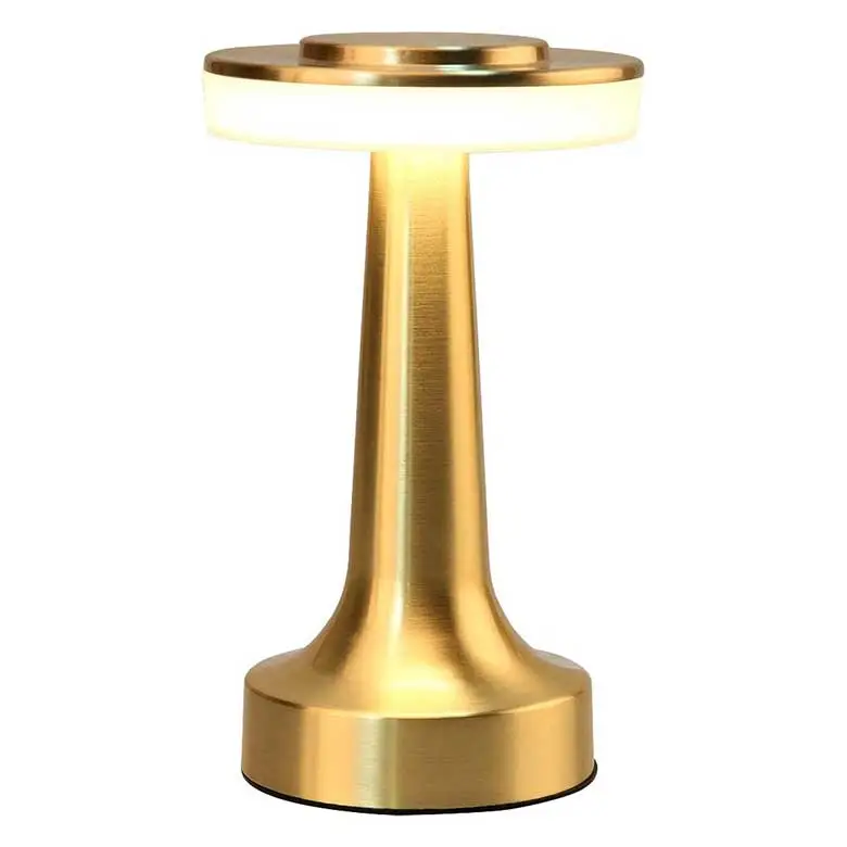 Modern gold table lamp with a sleek, cylindrical base and circular light