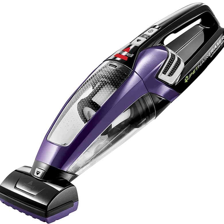 Purple handheld vacuum cleaner with clear dust container and ergonomic handle