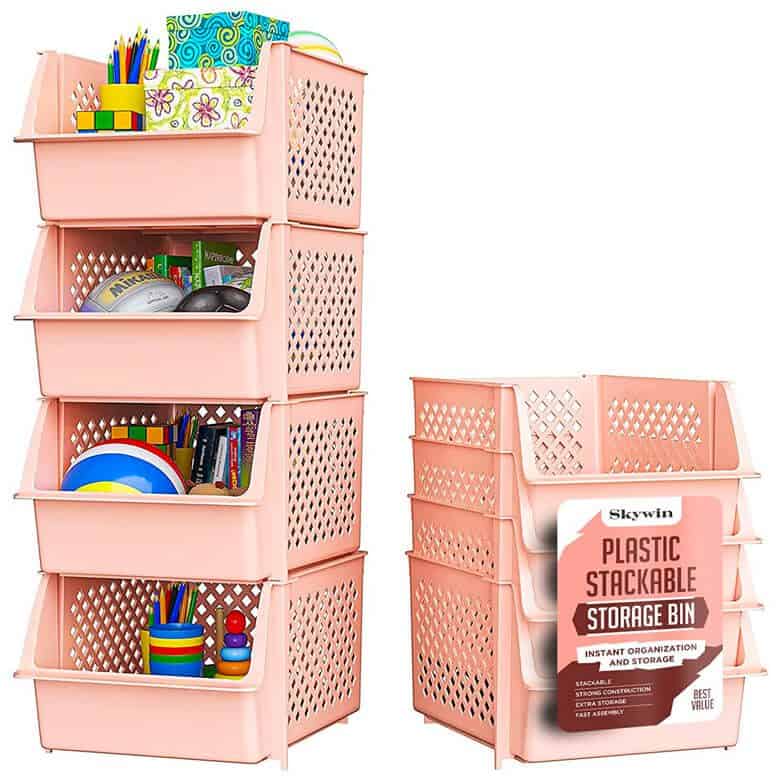 Stackable pink plastic storage bins filled with toys, books, and supplies, ideal for organizing