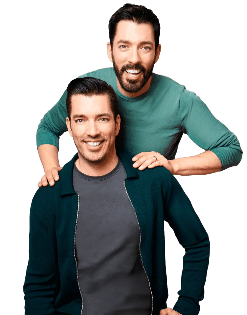 Scott brothers smiling and posing together, one standing behind the other