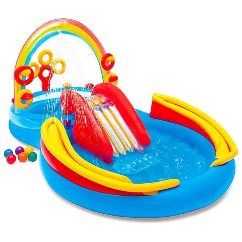 Inflatable kids' water play center with a slide, sprinklers, and a rainbow arch