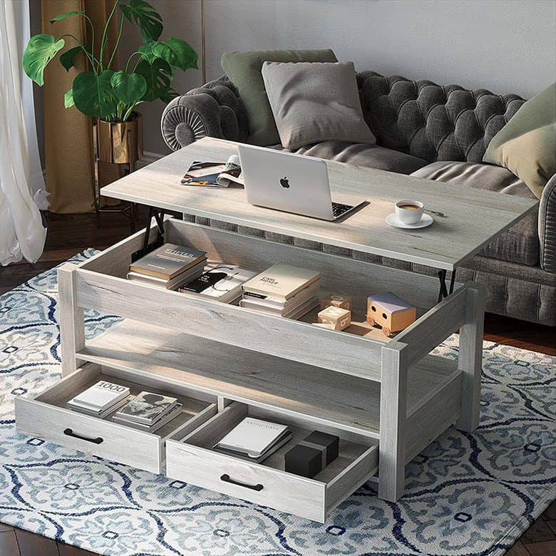 Living room with a gray lift-top coffee table featuring hidden storage, a tufted sofa, and decorative accents