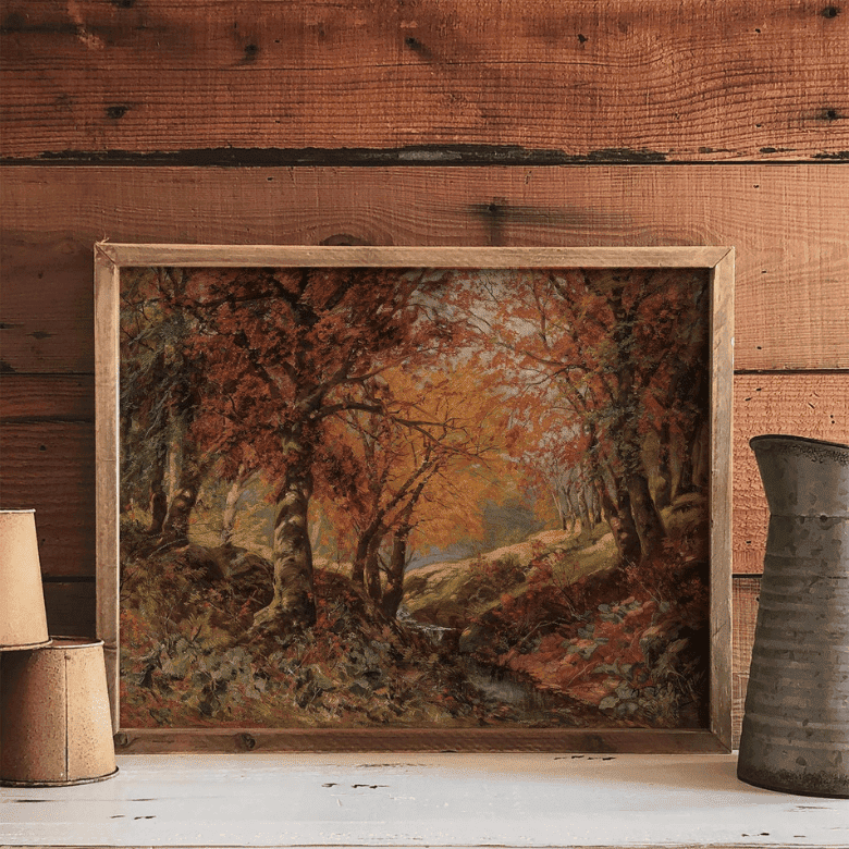 Framed autumn forest painting on rustic wood shelf