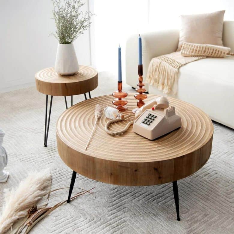 Modern living room with wooden tables, retro phone, and cozy decor