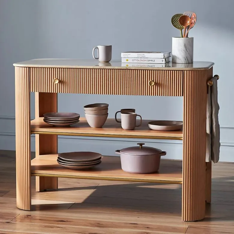 fluted wooden kitchen island with white marble top