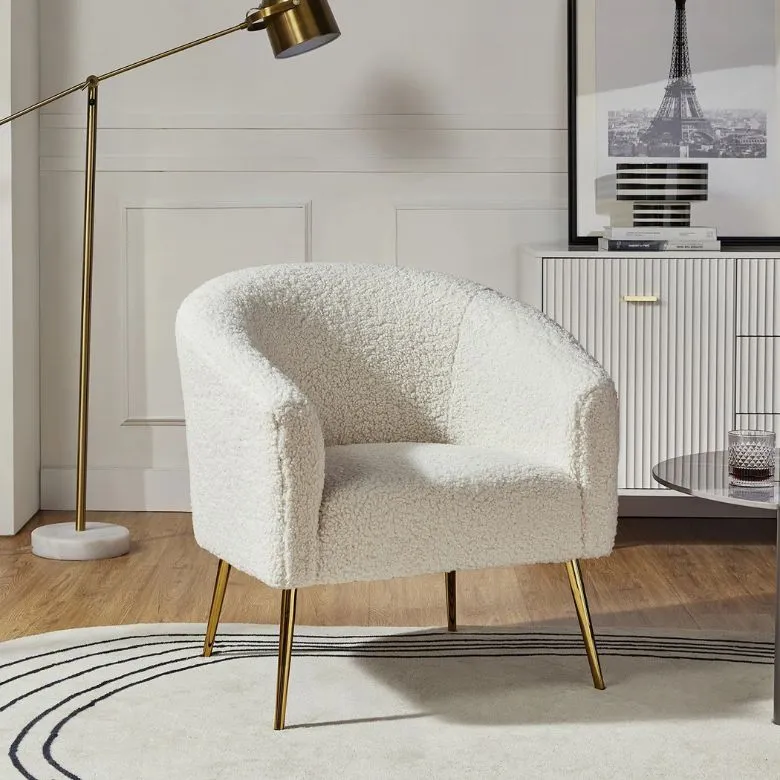white boucle arm chair with legs